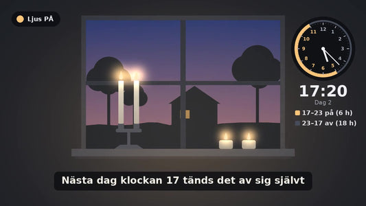 Batteriljus med timer tända i fönstret en höstkväll